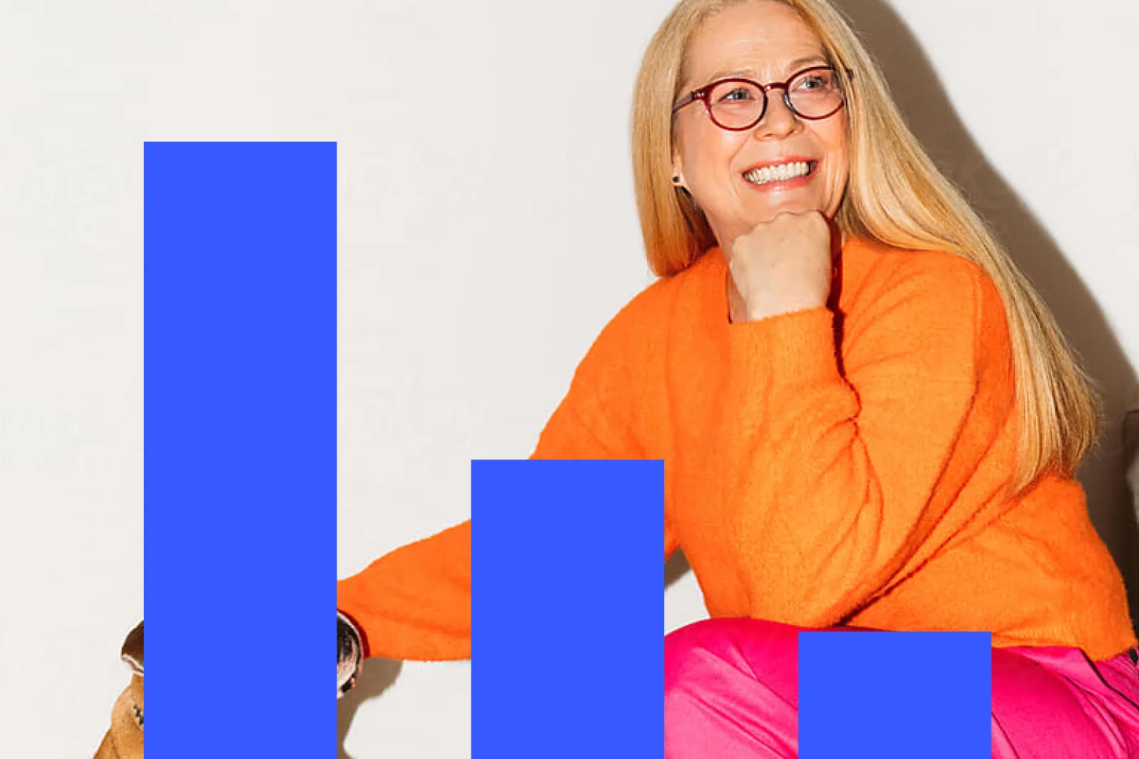 Smiling woman wearing glasses, blue bar graphs in foreground