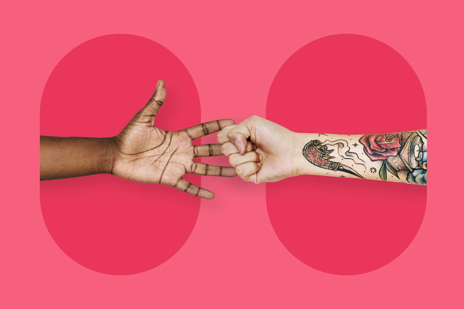 Two hands with tatoos playing rock paper scissors
