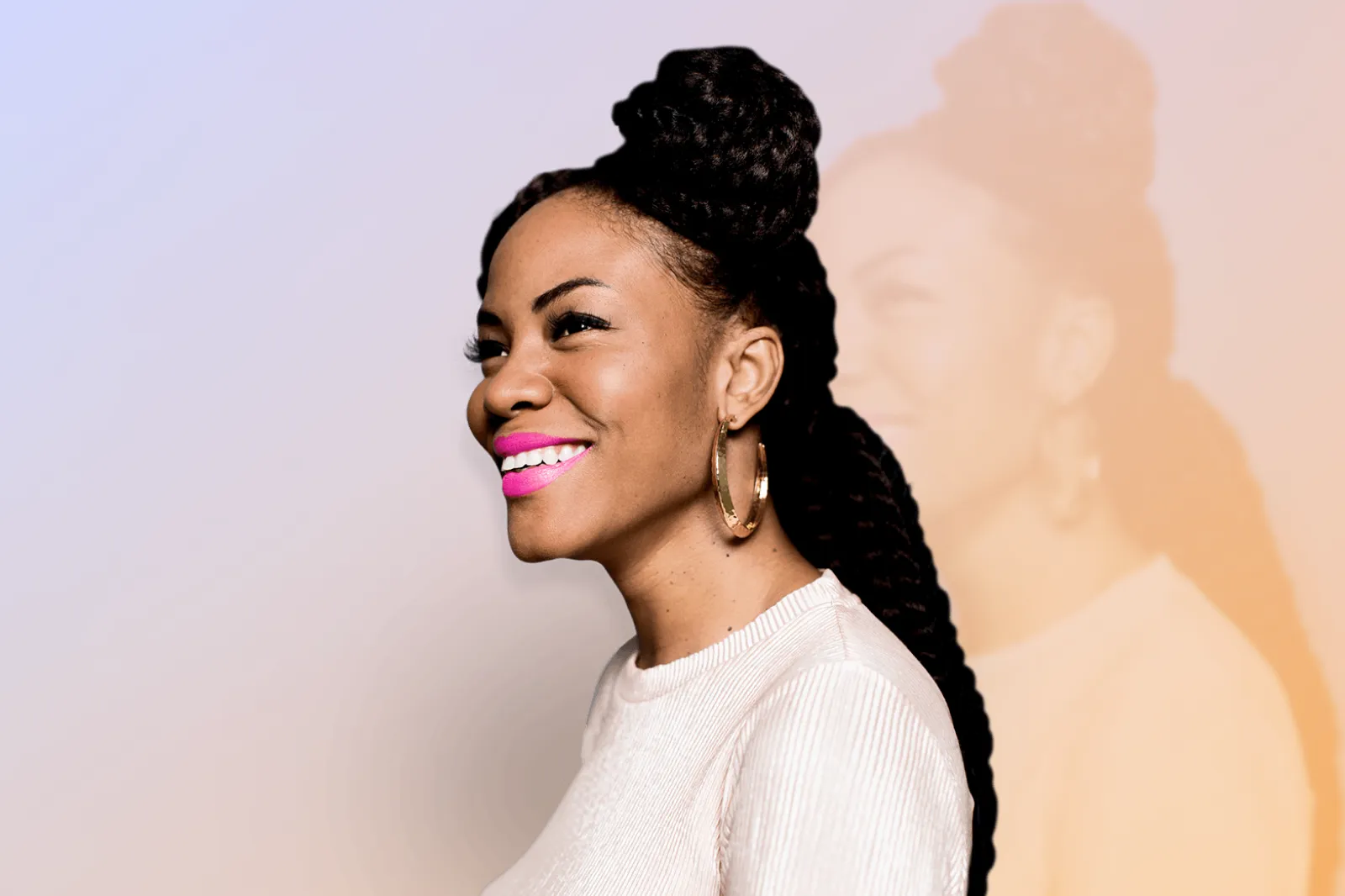 Smiling woman in curly hair with a gradient background 
